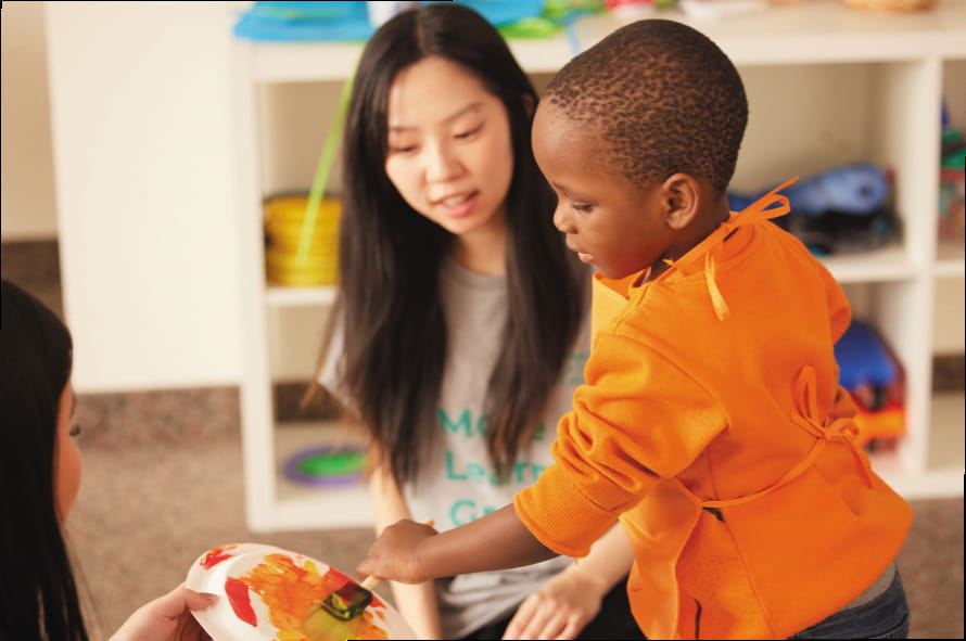 a child with a disability painting