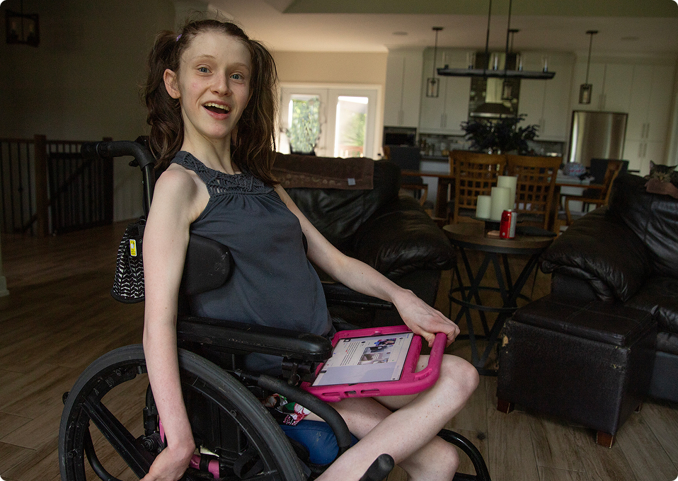 girl-wheelchair-with-tablet