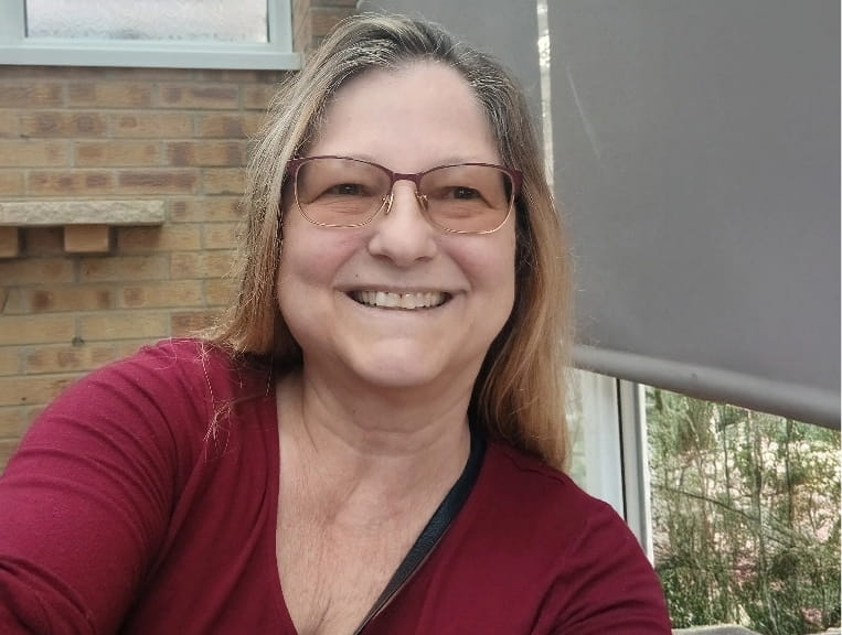 a child with a disability painting